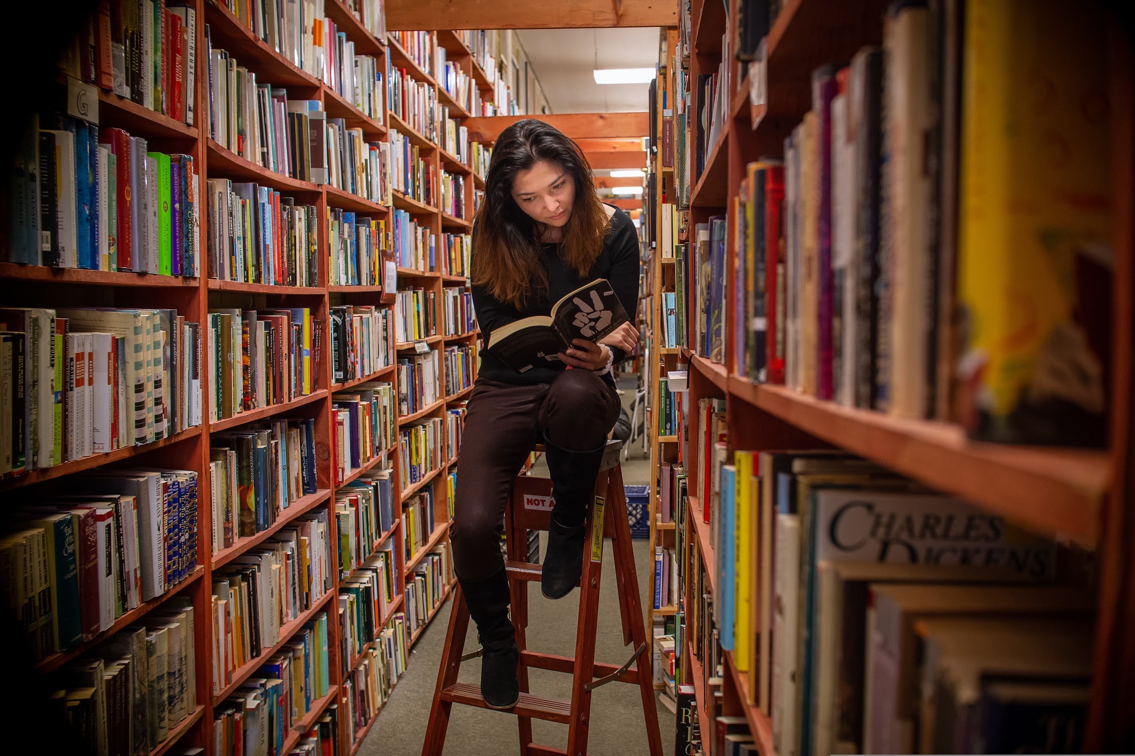 Sitora reading in a bookstore
